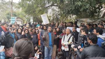 JNU faculty addressing the media and students on campus on Monday