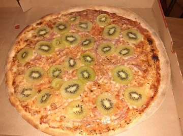 As the photo showed, the standard pizza base was freckled with pepperoni-style kiwi slices.