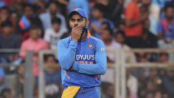 India's captain Virat Kohli gestures during the first one-day international cricket match between India and Australia in Mumbai