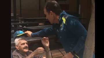 Justin Langer's gesture towards 80-year-old wheelchair-bound fan wins hearts