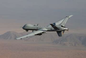 An MQ-9 Reaper, armed with GBU-12 Paveway II laser guided munitions and AGM-114 Hellfire missiles. 