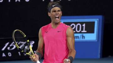 Spain's Rafael Nadal celebrates after winning the third set against Australia's Nick Kyrgios during their fourth round singles match at the Australian Open tennis championship in Melbourne