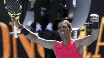 Spain's Rafael Nadal celebrates after defeating Bolivia's Hugo Dellien during their first round singles match at the Australian Open tennis championship in Melbourne