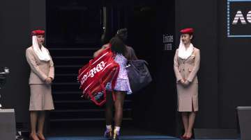 Serena Williams of the U.S. leaves Rod Laver Arena after the third round single loss to China's Wang Qiang at the Australian Open tennis championship in Melbourne