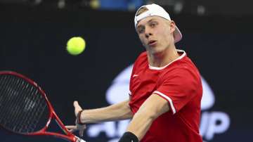 Denis Shapovalov of Canada plays a shot during his match against Stefanos Tsitsipas of Greece at the ATP Cup tennis tournament in Brisbane