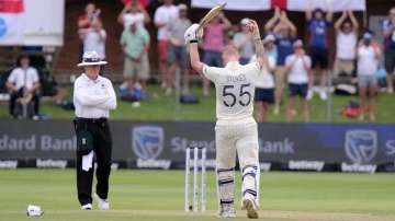 England's Ben Stokes celebrates reaching his century during day two of the third cricket test between South Africa and England in Port Elizabeth