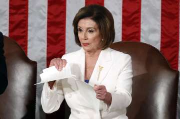 House Speaker Nancy Pelosi of Calif., tears her copy of President Donald Trump's State of the Union 