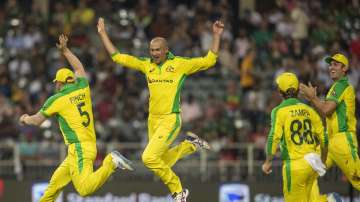 Australia's bowler Ashton Agar, second from left, celebrates with teammates after dismissing South Africa's batsman Dale Steyn during the 1st T20 cricket match between South Africa and Australia at Wanderers stadium in Johannesburg