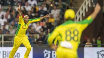 Australia's bowler Ashton Agar celebrates with teammates after dismissing South Africa's batsman Dale Steyn during the 1st T20 cricket match between South Africa and Australia at Wanderers stadium in Johannesburg