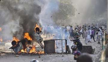 Flash protests in Hyderabad against Delhi violence