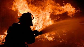 kolkata fire, fire in car showroom, cars charred, new cars charred, 