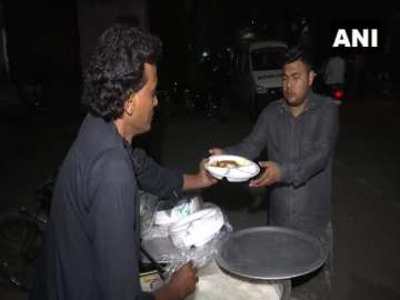 Delhi violence: Locals distribute food to injured admitted at GTB Hospital