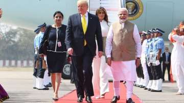Who is the Indian woman accompanying Donald Trump and Melania