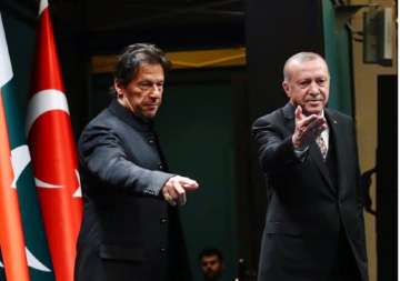 A file photo of Pakistan PM Imran Khan, seen here with Turkey's President Recep Tayyip Erdogan