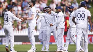 Ishant Sharma of India celebrates with Hanuma Vihari after taking the wicket of Ross Taylor of New Zealand during day two of the First Test match between New Zealand and India at Basin Reserve on February 22