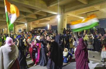 Women gather near Delhi's Jaffrabad metro station to protest against CAA, NRC
