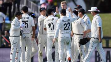 Kyle Jamieson of New Zealand (C) is congratulated by team mates after dismissing Ravindra Jadeja of India during day one of the Second Test match between New Zealand and India at Hagley Oval on February 29, 2020 in Christchurch, New Zealand. 