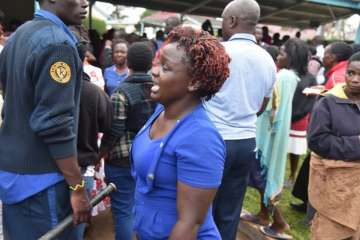 A woman reacts at the Kakamega Teaching and Referral Hospital following a stampede at Kakamega Primary School (Twitter/Kenyan media)