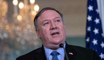China 'will pay a price' for causing 'huge challenge' for global economy, says Pompeo