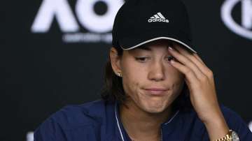 Spain's Garbine Muguruza answers questions at press conference following her loss to Sofia Kenin of the U.S. in the women's final at the Australian Open tennis championship in Melbourne, Australia, Saturday.