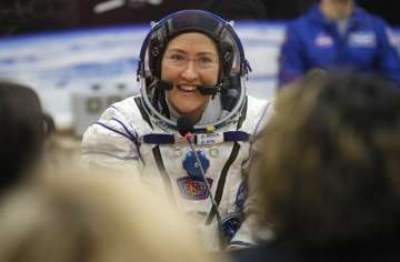 NASA’s record-setting Christina Koch, crewmates safely back from space