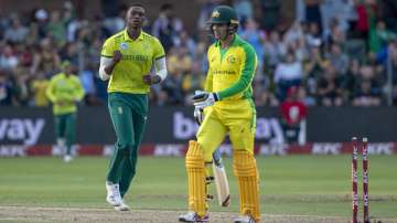 South Africa's bowler Lungi Ngidi, left, celebrates after bowling Australia's batsman Alex Carey for 14 runs during the 2nd T20 cricket match between South Africa and Australia at St George's Park in Port Elizabeth, South Africa