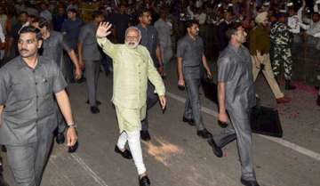A file photo of Prime Minister Narendra Modi waving to his supporters