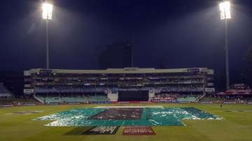 Rain covers on as match abandoned for the 2nd One Day International cricket match between South Africa and England at Kingsmead stadium in Durban, South Africa