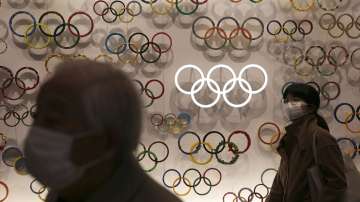 The IOC said it was still committed to holding the Olympics as scheduled, beginning July 24.