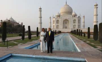 President Trump and the First Lady held hands as they strolled at the Taj complex and later wrote in