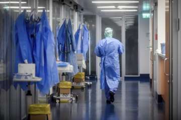 A view of the corridor outside the intensive care unit of the hospital of Brescia, Italy, Thursday, 