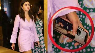 How cute! Alia Bhatt's phone wallpaper has photo of her kissing Ranbir Kapoor. Watch video