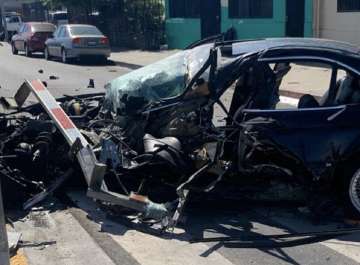 Chilling video shows BMW getting crushed into pieces by a train