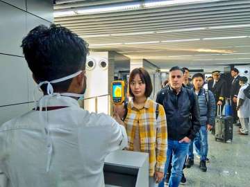 A passenger being screened at an airport in India.