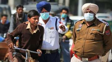 Punjab police personnel wearing protective masks in the wake of the coronavirus scare in Bathinda (file photo)
