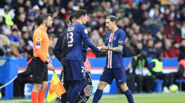PSG's Angel Di Maria, right, walks off after being substituted by PSG's Julian Draxler during the French League One soccer match between Paris-Saint-Germain and Dijon, at the Parc des Princes stadium in Paris, France, Saturday, Feb. 29