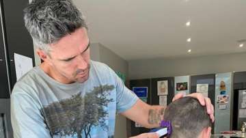 Kevin Pietersen gives himself and son 'tennis ball' haircut