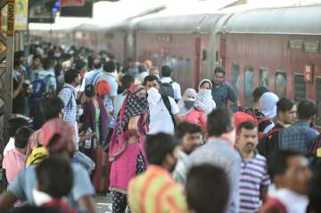 Passengers board a crowded train amid worldwide coronavirus scare (Representative Image)