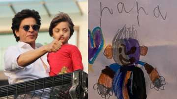 Shah Rukh Khan beams with joy as little munchkin AbRam draws a picture of him