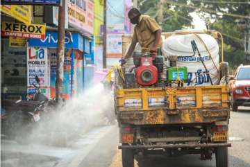 A worker sprays disinfectant in the wake of deadly coronavirus in Tamil Nadu