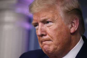  President Donald Trump speaks about the coronavirus in the Rose Garden of the White House, Tuesday,