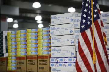 FILE - In this March 24, 2020, file photo stacks of medical supplies are housed at the Jacob Javits 