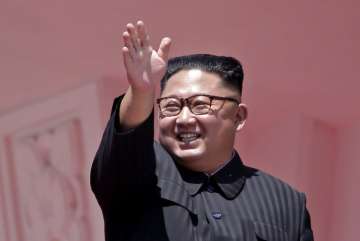 FILE - In this Sunday, Sept. 9, 2018 file photo, North Korean leader Kim Jong Un waves after a parade for the 70th anniversary of North Korea's founding day in Pyongyang, North Korea. North Korea’s collapse has been predicted — wrongly — for decades. So it is no surprise that unconfirmed rumors that current leader Kim Jong Un is seriously ill have raised worries about what Washington and North Korea’s neighbors would do if things fall apart in any post-Kim North Korea. (AP Photo/Kin Cheung, File)
 