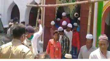 People coming out of a mosque after local authorities objected to them congregating at a mosque for Friday prayers in West Bengal's Murshidabad district (screenshot)