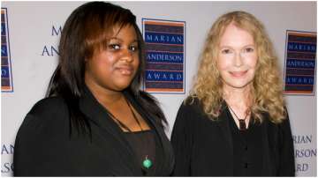 Mia Farrow says her daughter Quincy has COVID-19