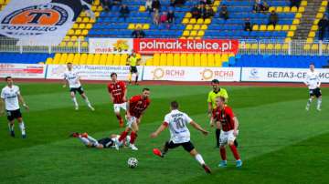 A football match taking place in empty stadium before coronavirus lockdown