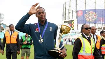 Jofra archer with the World Cup 2019 trophy