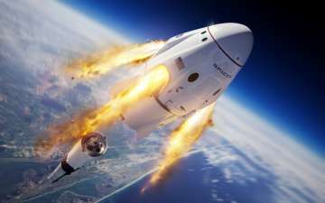 This illustration made available by SpaceX depicts the company's Crew Dragon capsule and Falcon 9 ro