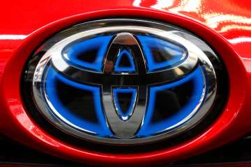 This Feb. 15, 2018, file photo shows the Toyota logo on the trunk of a 2018 Toyota Prius on display 