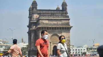 File photo of tourists wearing protective masks in view of coronavirus pandemic at Gateway of India in Mumbai (representational image)